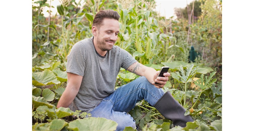 Man sitting on veg patch.jpg